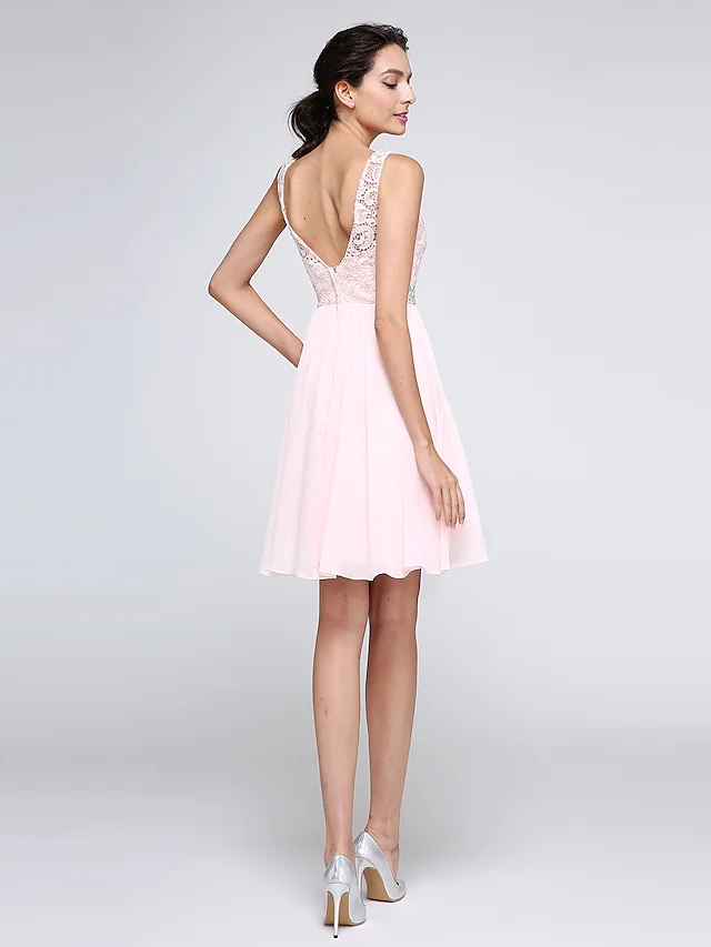 A-Line short mini cocktail dress with illusion neckline and intricate lace details.