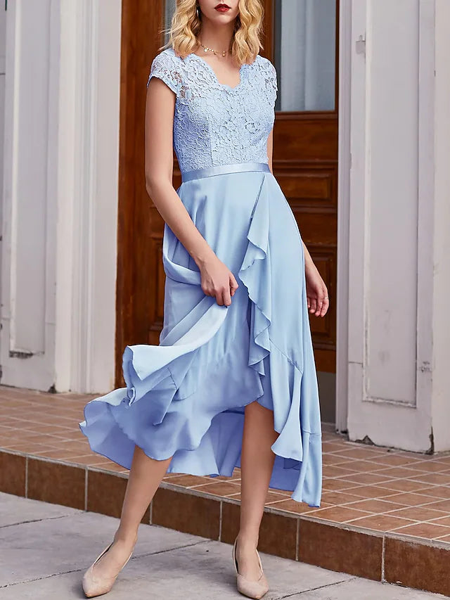 Side view of a black A-line one-shoulder cocktail dress.