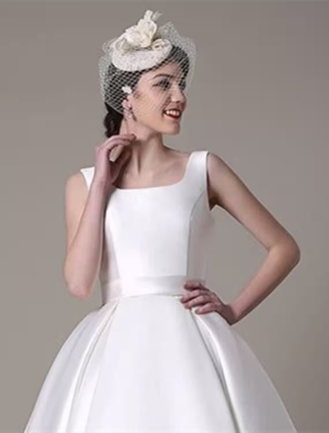 Side view of the knee-length A-line party dress.