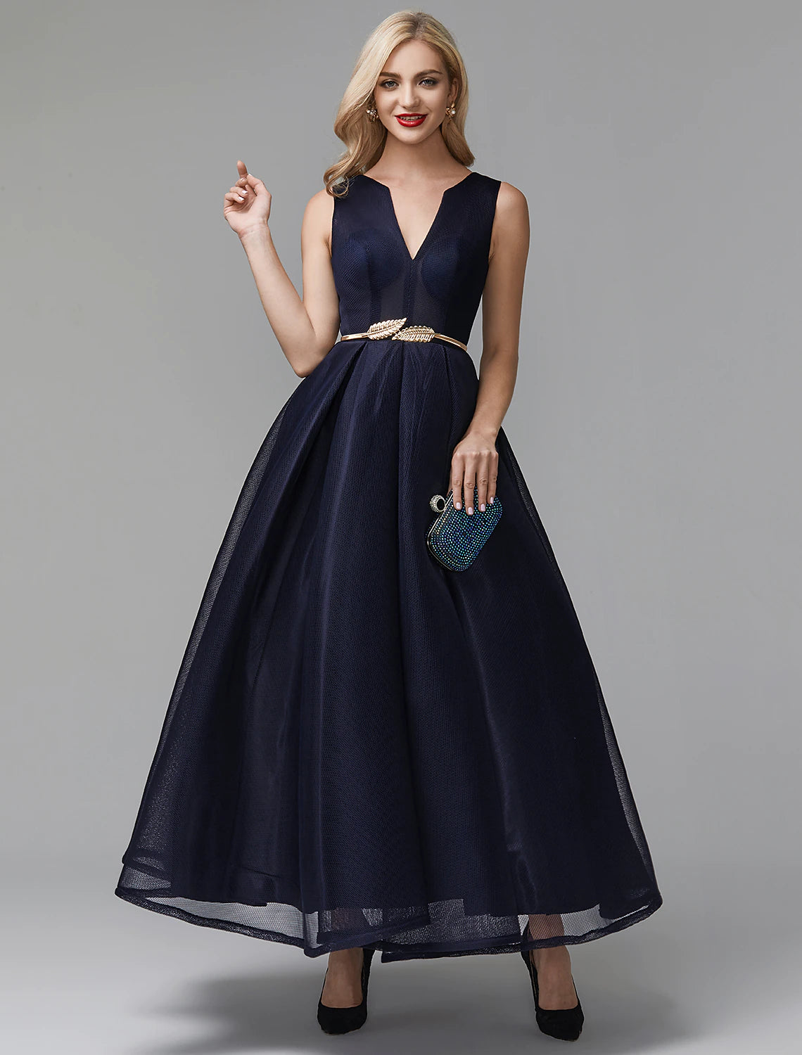 A-Line black prom dress with V-neck and sash.