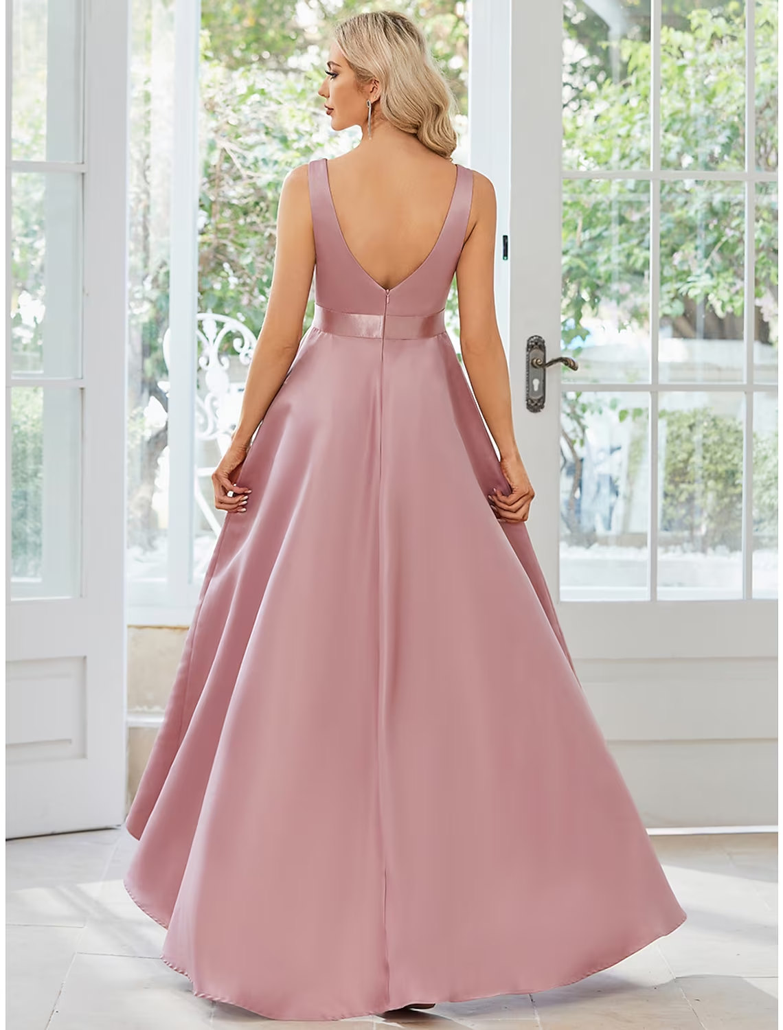Back view of the pure color satin dress, showing its elegant drape.