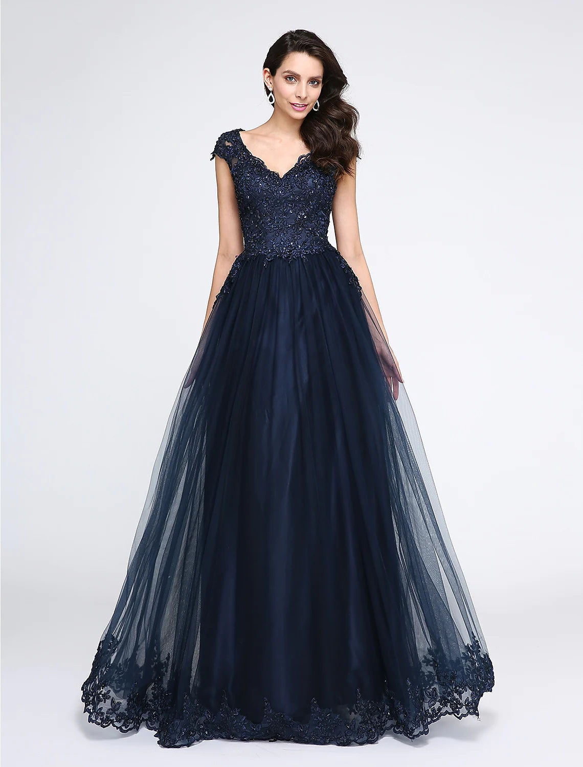 A-line black tulle prom dress with V-neck and appliques, front view.