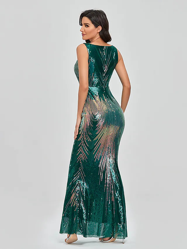 Side view of a woman showcasing the elegant silhouette of a sequined trumpet dress.