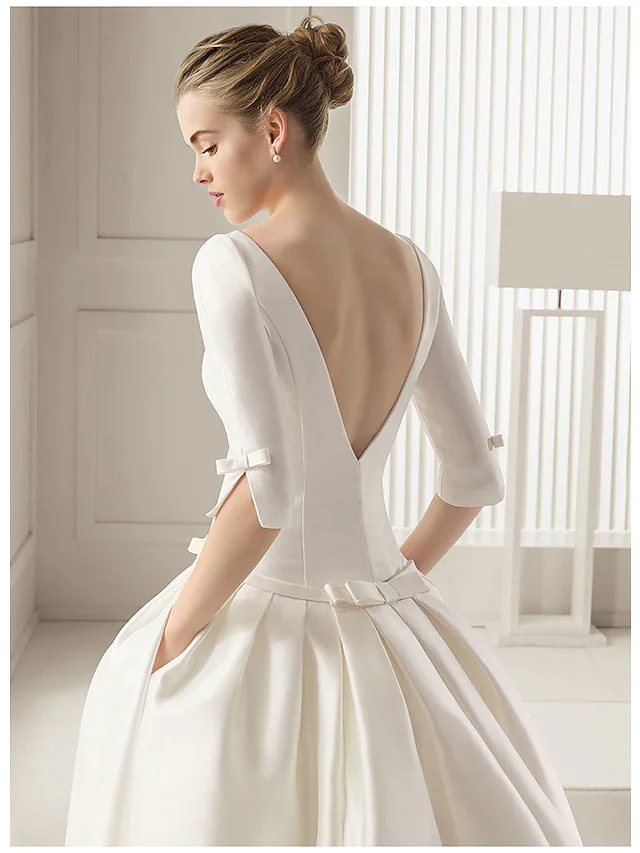 Close-up of the polyester fabric and detailing on the wedding dress.