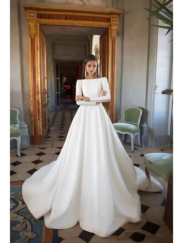 Side view of the A-Line wedding gown, showcasing the graceful court train.