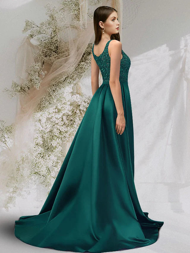 Back view of the A-line charmeuse gown, showcasing the court train and lace insert.