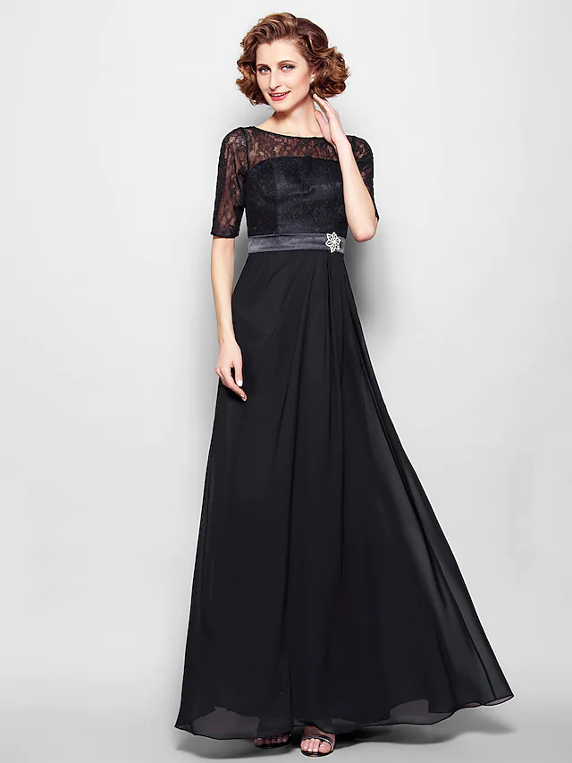 Elegant A-Line Mother of the Bride dress with jewel neck and half sleeves.