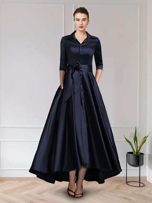 Elegant A-Line Mother of the Bride dress with jewel neck and short sleeves.