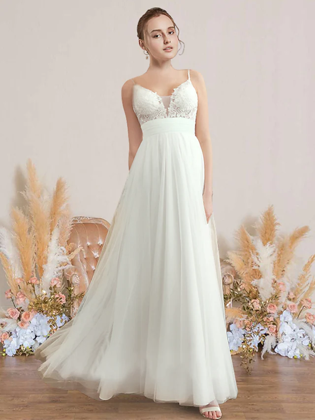 Front view of an elegant A-Line chiffon lace wedding dress with V-neck and spaghetti straps.