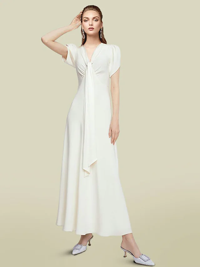 Elegant A-line chiffon Mother of the Bride dress with V-neck and short sleeves.