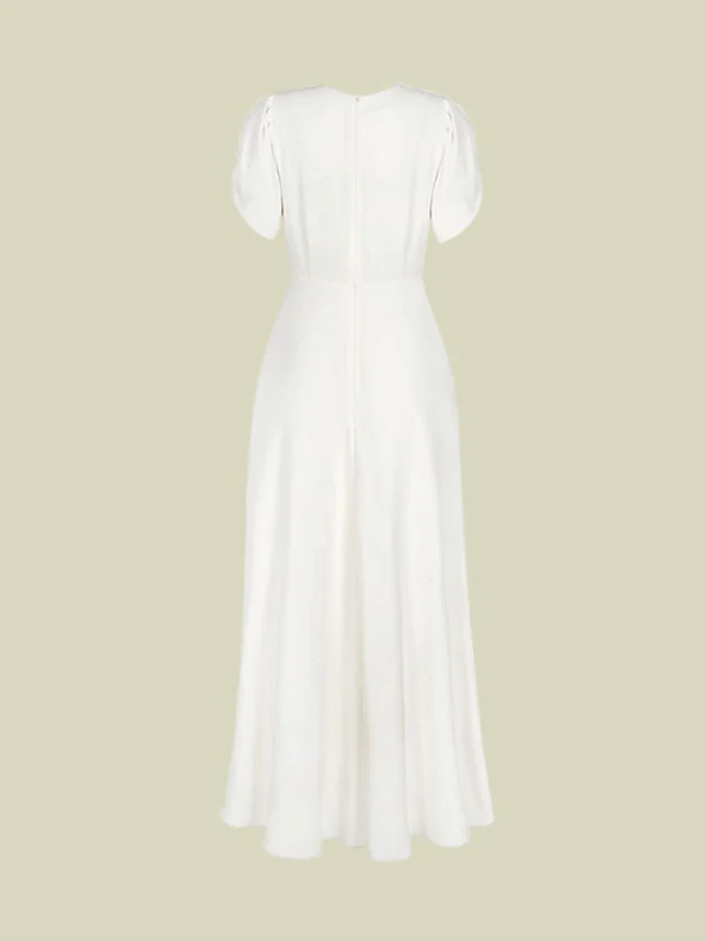 Back view of the ruched ankle-length chiffon gown.