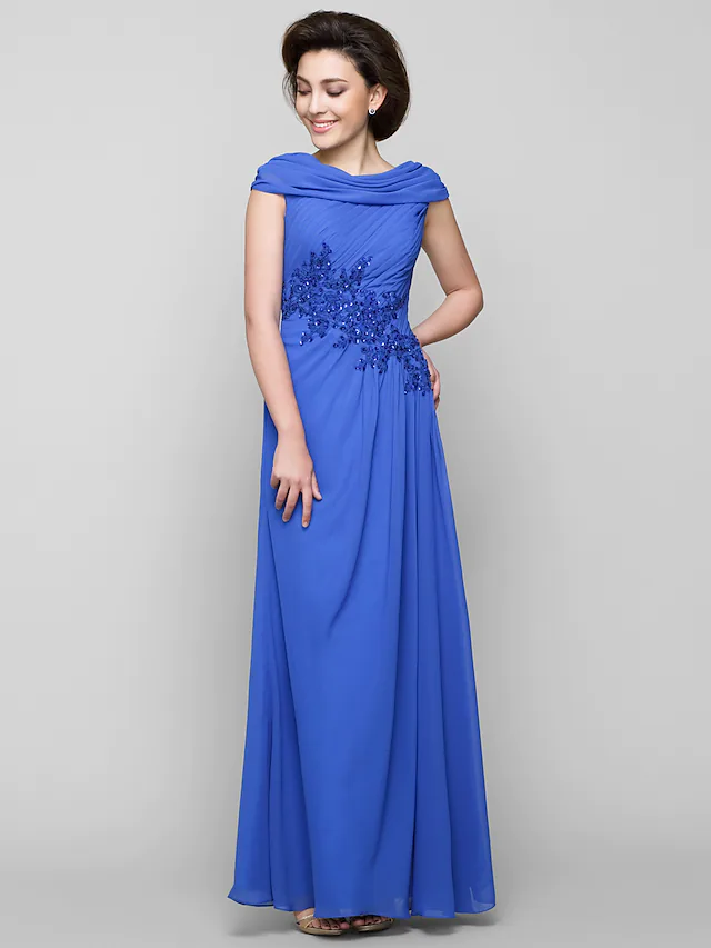 Back view of the Mother of the Bride dress with criss cross appliques.