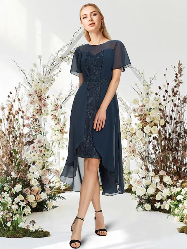 Elegant A-Line Empire chiffon dress with jewel neck and short sleeves.