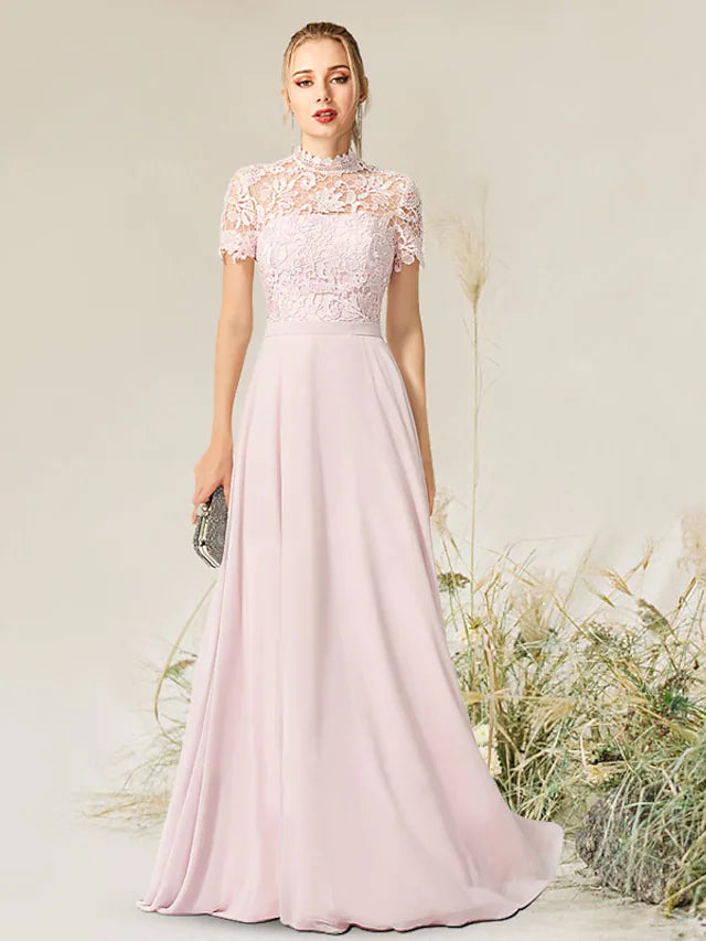 Elegant A-Line Empire evening gown with high neck and short sleeves.