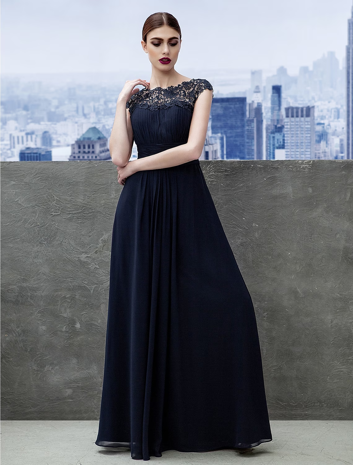 Side view of the floor-length A-line dress in chiffon.