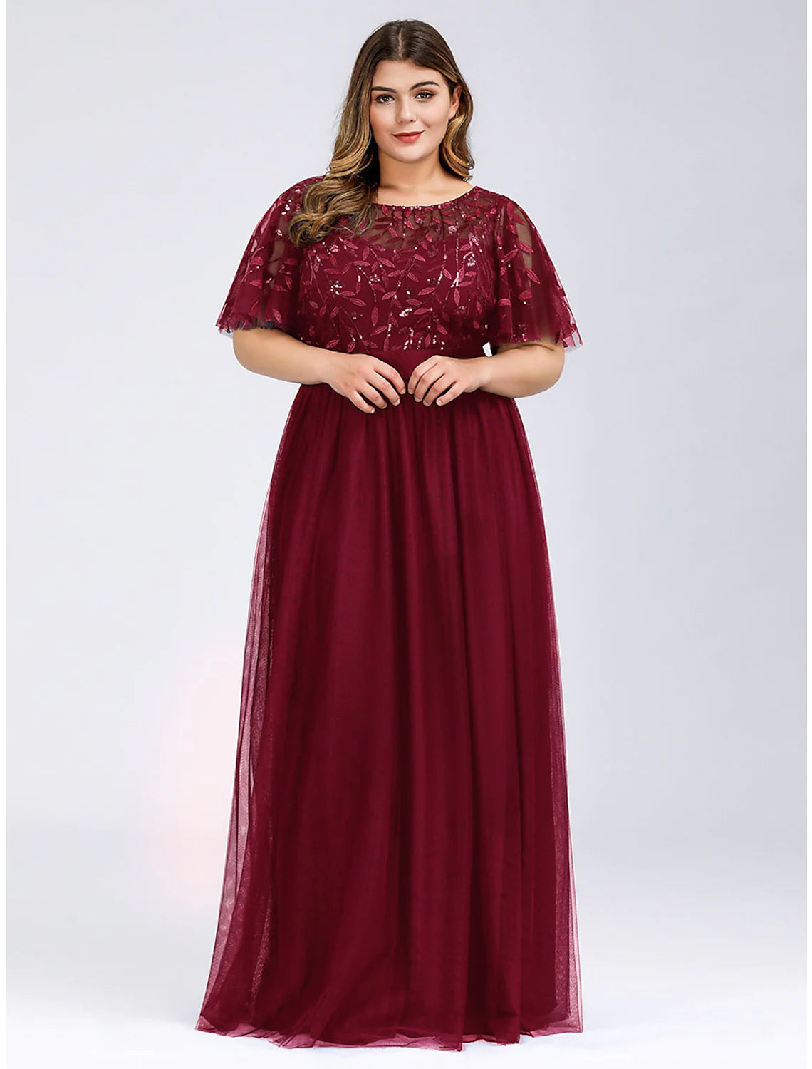 Back view of A-Line Empire Jewel Neck Short Sleeve Tulle Prom Gown with Sequin Appliques.