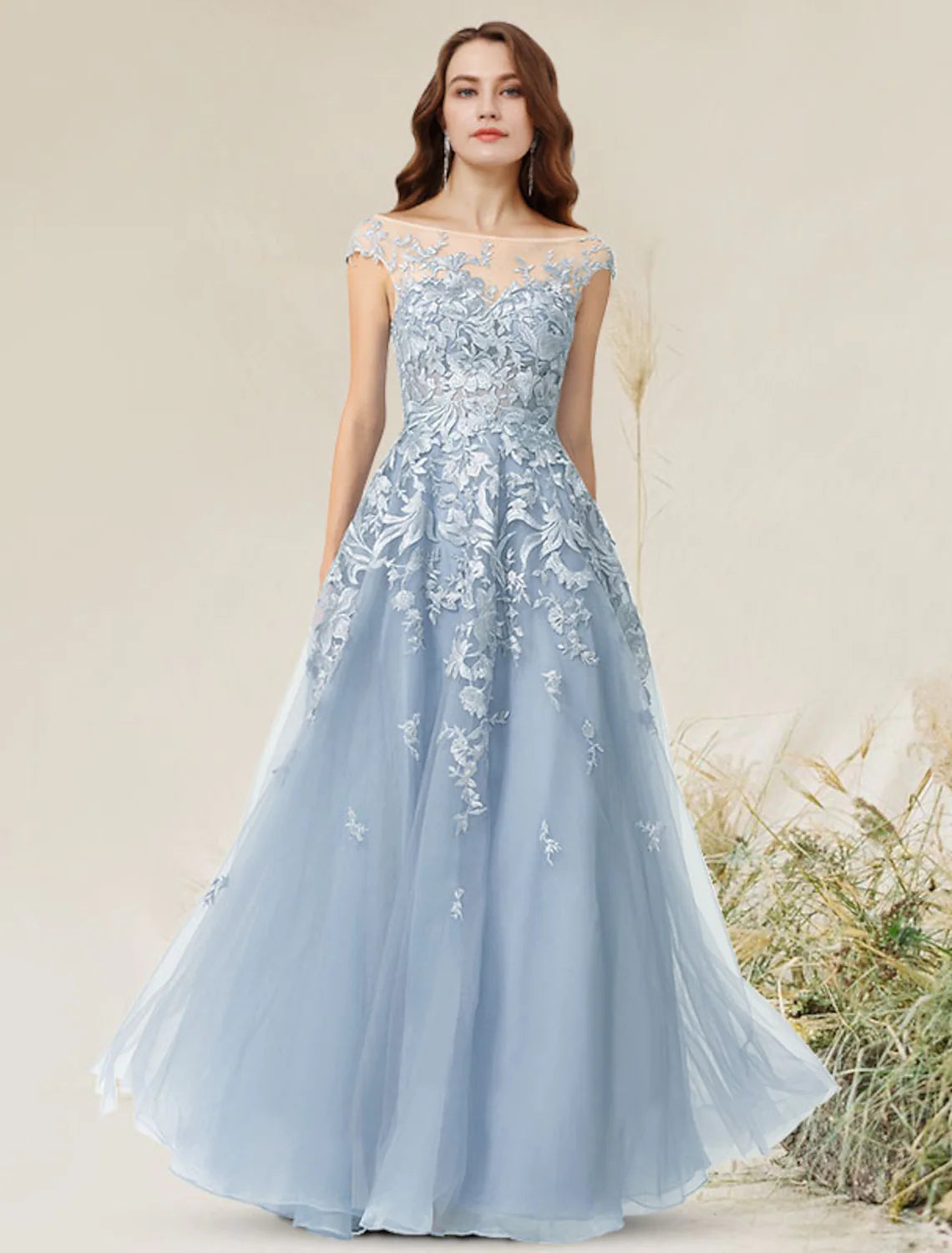 Elegant A-Line Empire evening dress with jewel neck, sleeveless design, and floor-length lace with appliques.