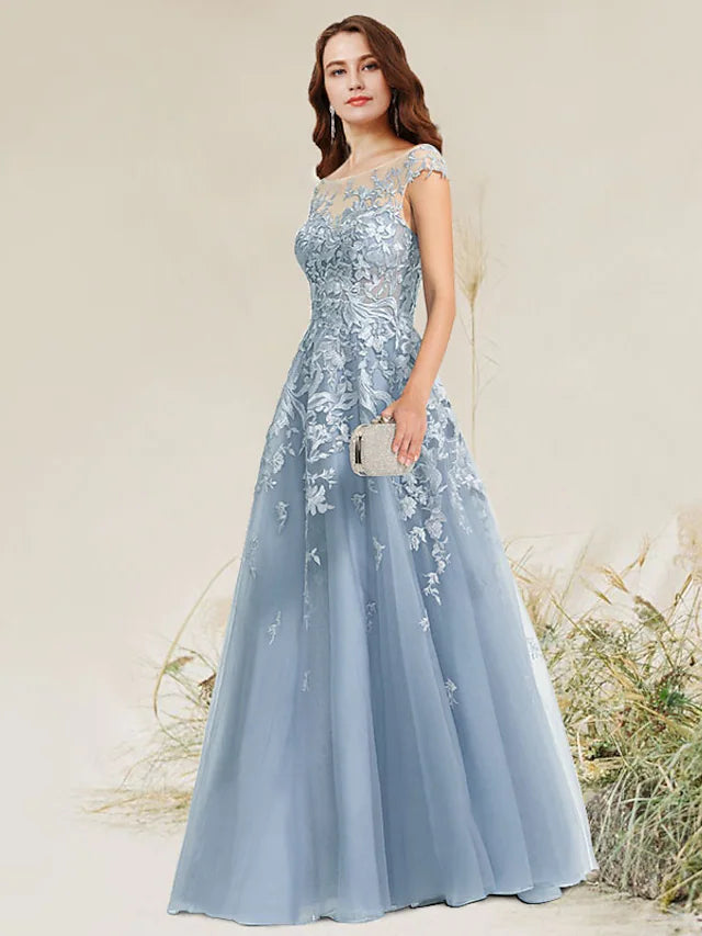 Side view of the A-Line Empire formal dress, highlighting lace and applique details.