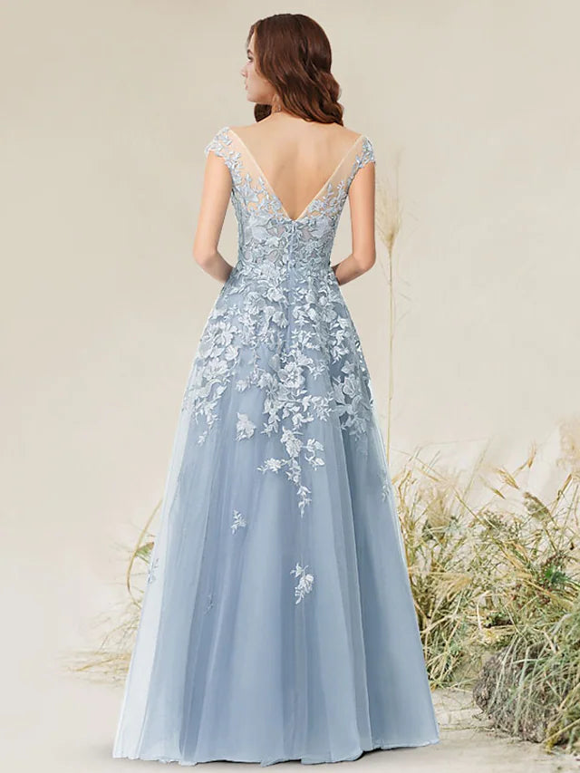 Back view of the sleeveless floor-length evening gown.