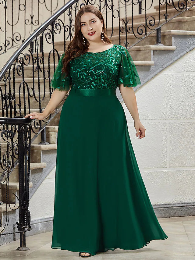 Detail of the jewel neckline and short sleeves on the elegant prom dress.