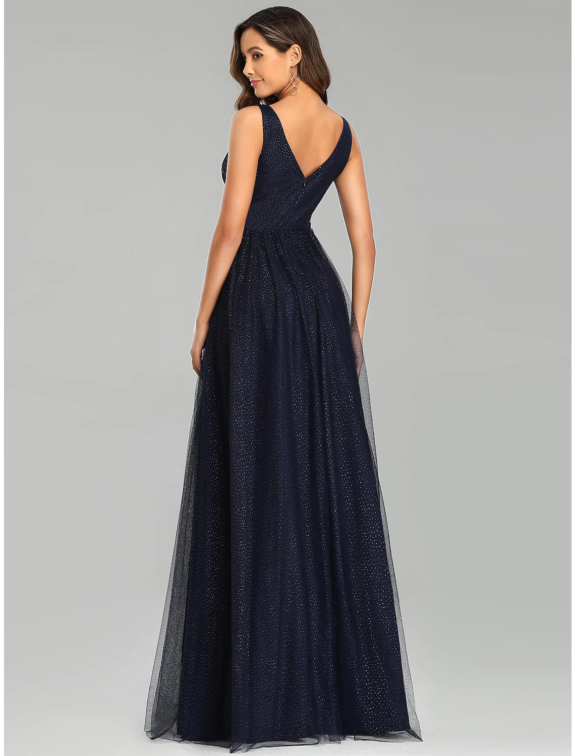 Side view of the graceful floor-length A-line prom dress, ideal for wedding guests.