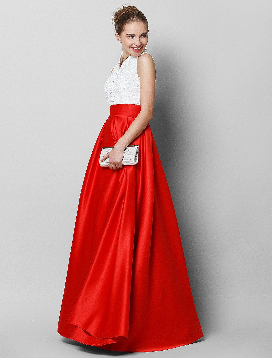 Back view of A-line high neck color block formal gown.