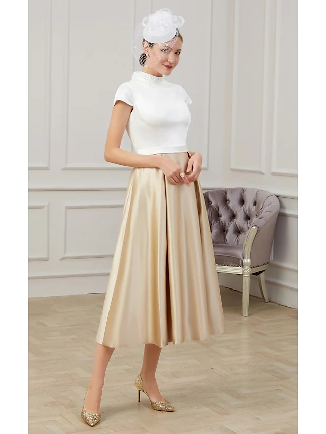 Back view of the elegant high neck Mother of the Bride dress.