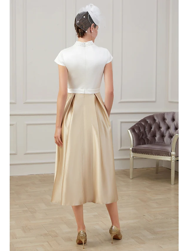 Close-up of the polyester fabric and pleats on the A-Line dress.