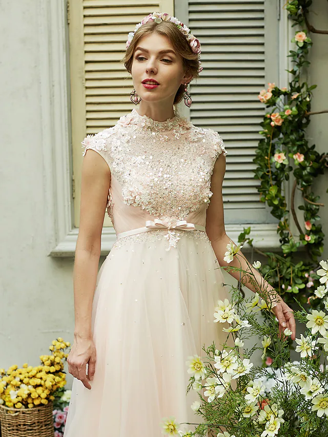 Full length view of A-Line bridal gown.