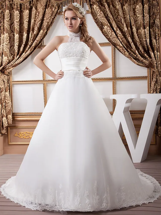 Elegant A-Line wedding dress with high neck and court train.