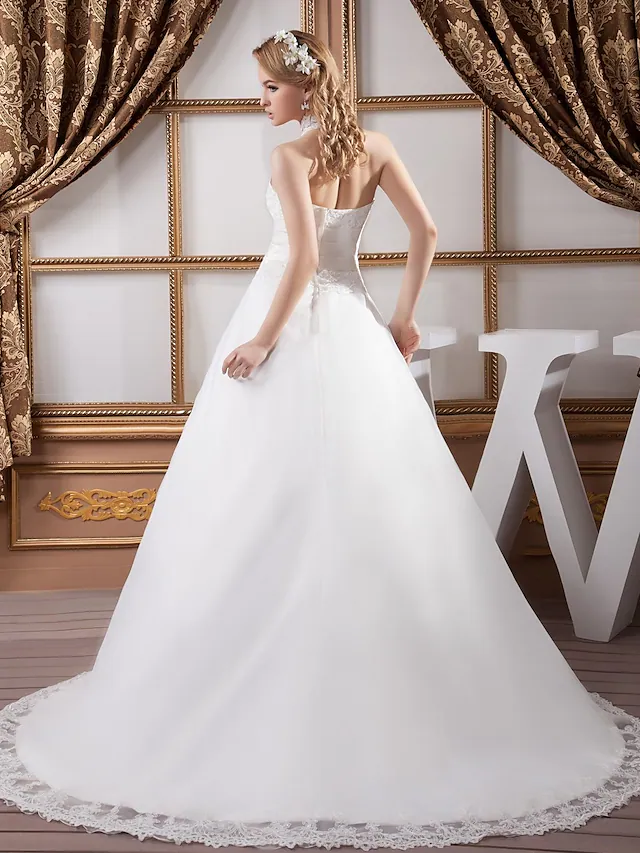Side view of A-Line bridal gown with regular straps.
