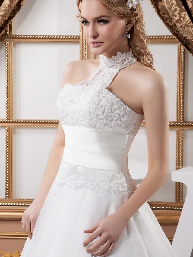 Full length view of high neck A-Line wedding dress.