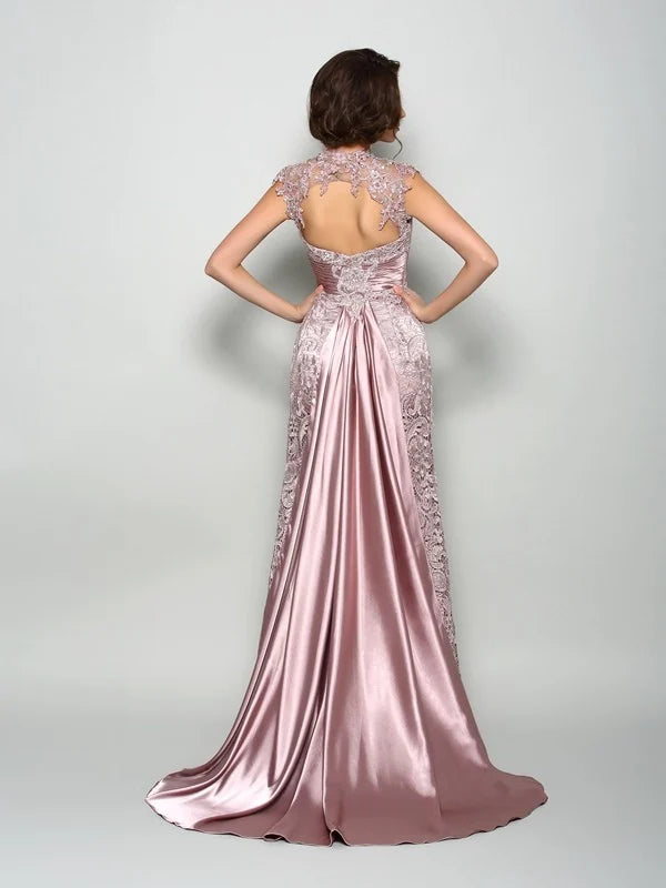 Full length view of a sophisticated long satin dress.