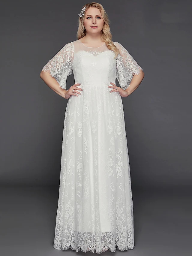 Elegant A-Line wedding dress with illusion jewel neck and half sleeves, featuring lace and tulle fabric.
