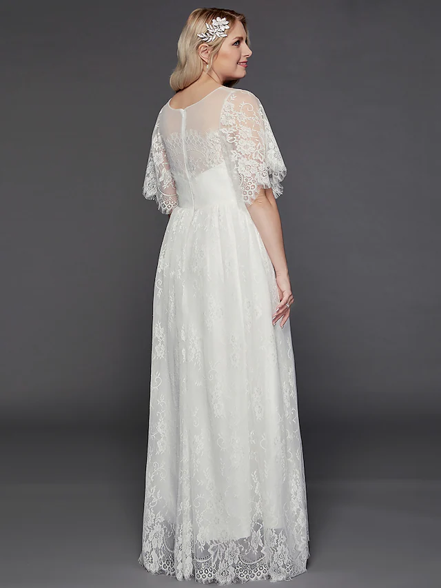 Back view of the A-Line wedding dress, showing delicate lace details and a flowing floor-length skirt.