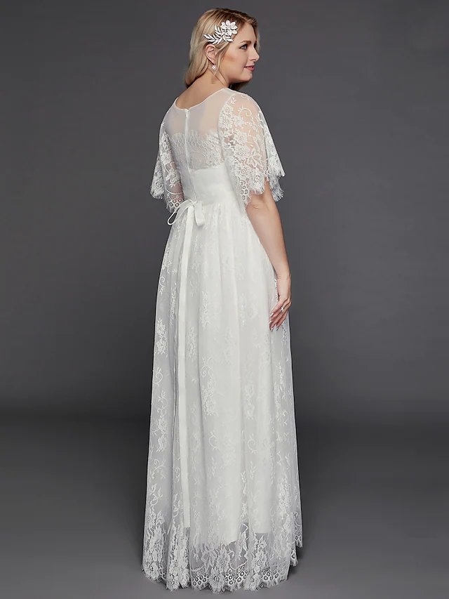 Bride wearing the white A-Line wedding dress, showcasing its formal and romantic style.