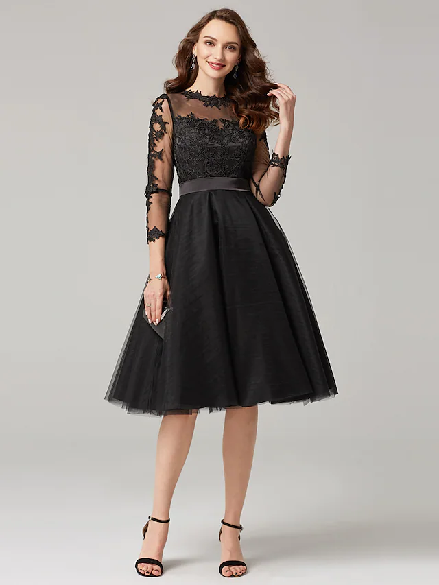 Elegant A-line knee-length dress with illusion neckline and 3/4 sleeves, front view.