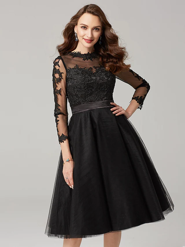 Side profile of the knee-length prom dress, showing sleeve detail.