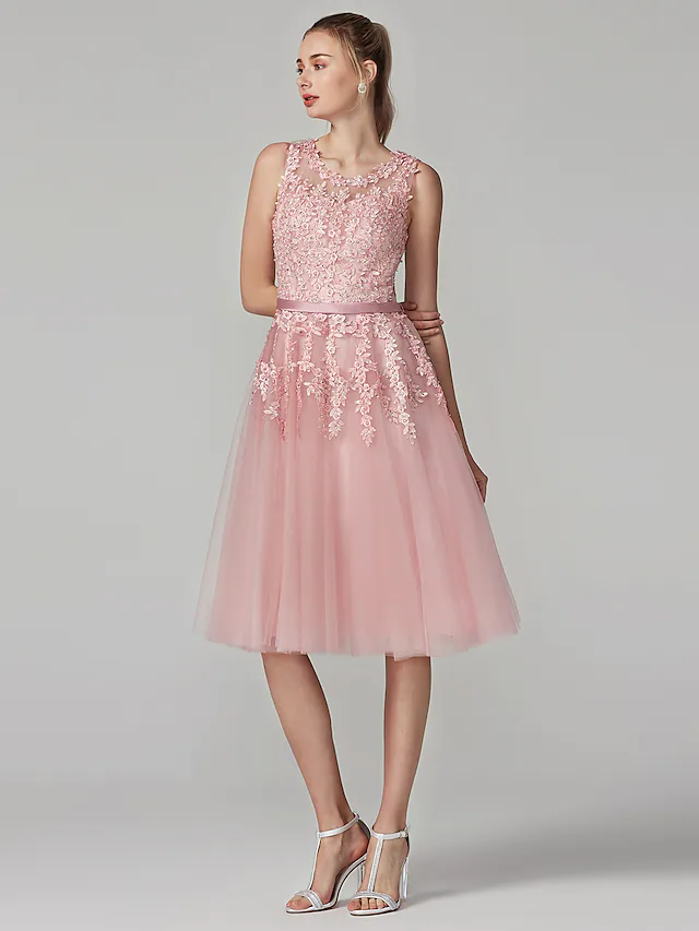 Side view of an A-line floral beaded knee-length dress.