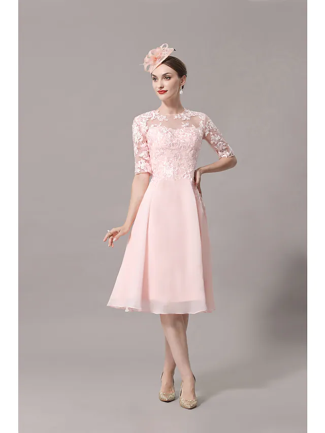Side view of the A-Line Mother of the Bride dress, showcasing the half sleeves and pleated satin skirt.