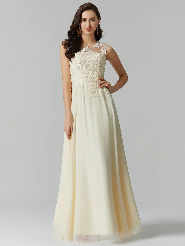 Close-up of the illusion neckline and applique details on the A-line gown.