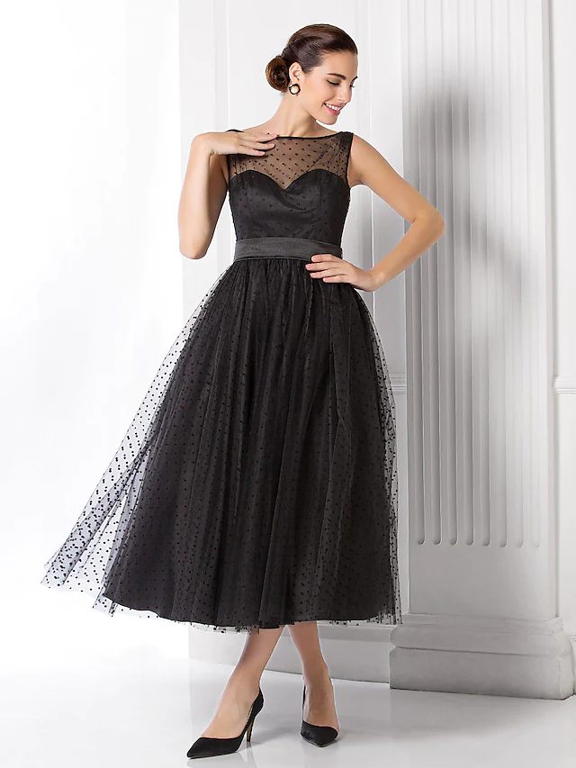 Elegant A-Line black cocktail dress with illusion neck and pattern print tulle.
