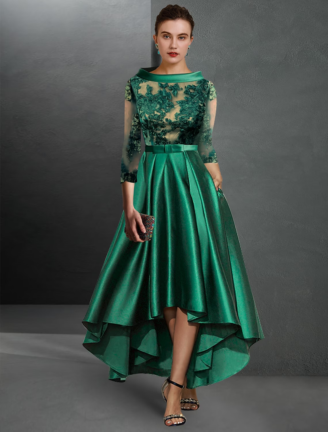 Elegant A-Line satin cocktail dress with jewel neck and 3/4 sleeves.