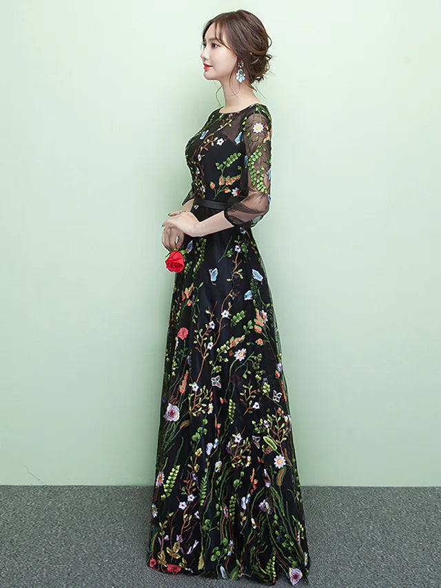 Full length view of the elegant formal dress with intricate details.