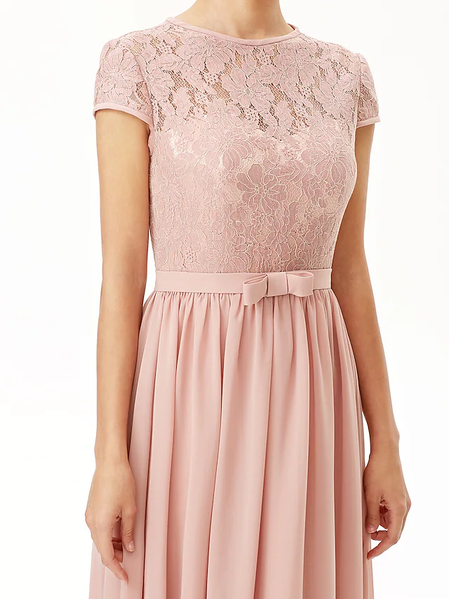 Close-up of jewel neck and corded lace on bridesmaid dress.