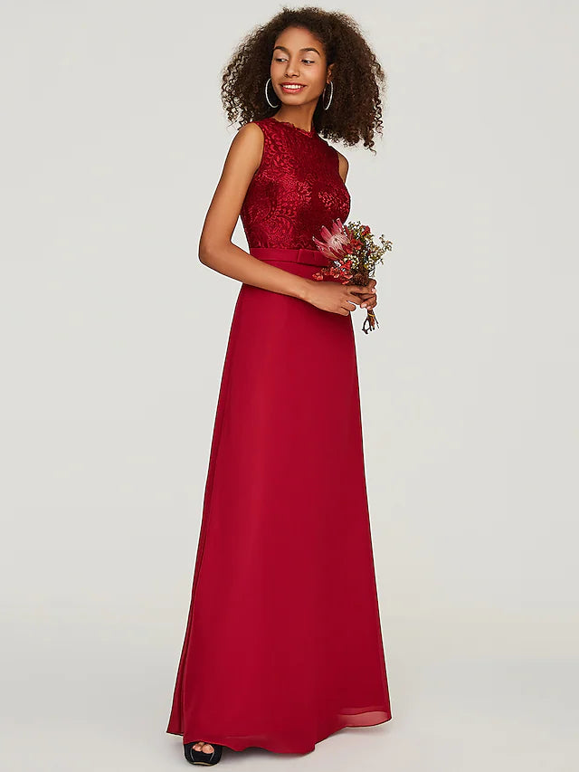 Close-up of the delicate lace and chiffon fabric on the bridesmaid dress.