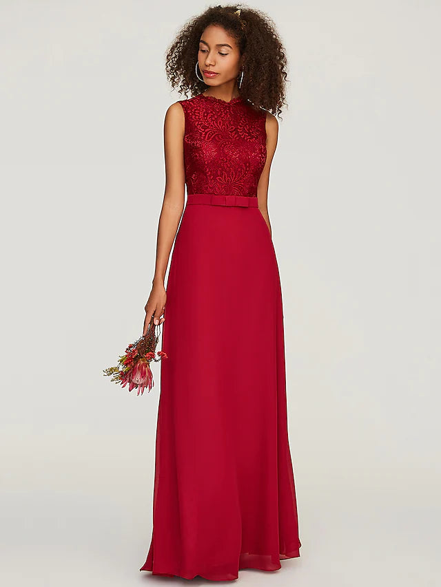 Detail of the sash and bow on the elegant A-line bridesmaid dress.