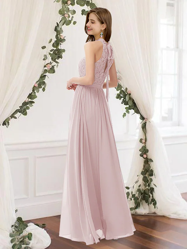 Floor length jewel neck A-line bridesmaid gown.