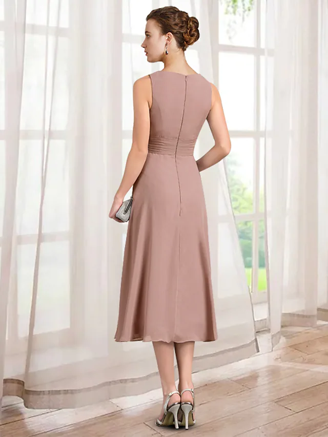 Back view of the A-line Mother of the Bride dress, showing tea length and chiffon fabric.