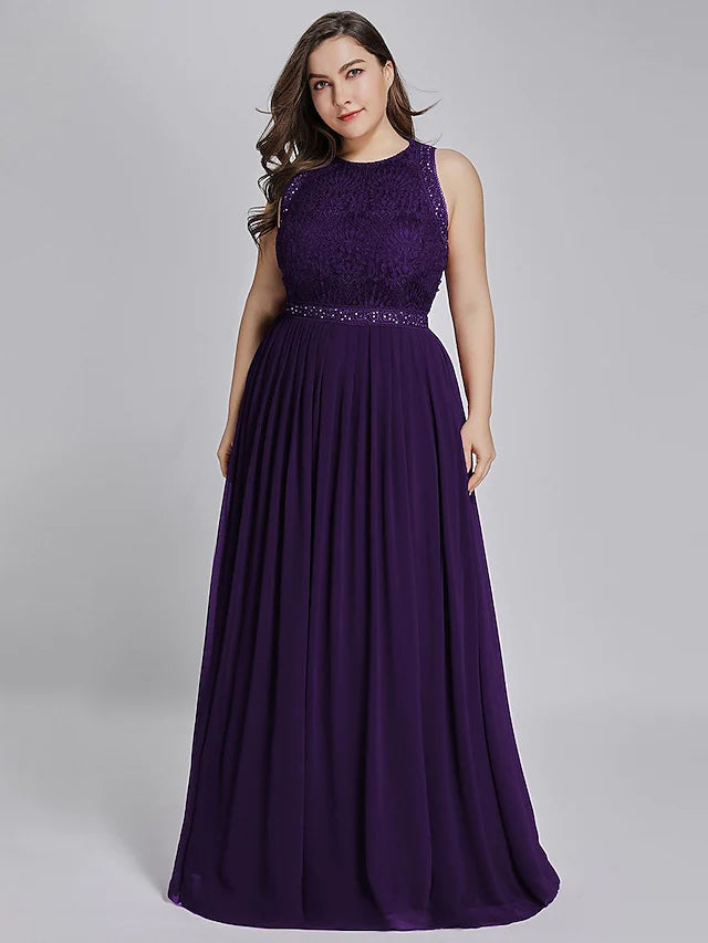 Detail of the flowing chiffon fabric and crystal accents on the gown.